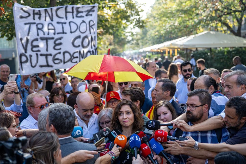 La presidenta de la comunidad de Madrid, Isabel Díaz Ayuso, a su llegada a la manifestación