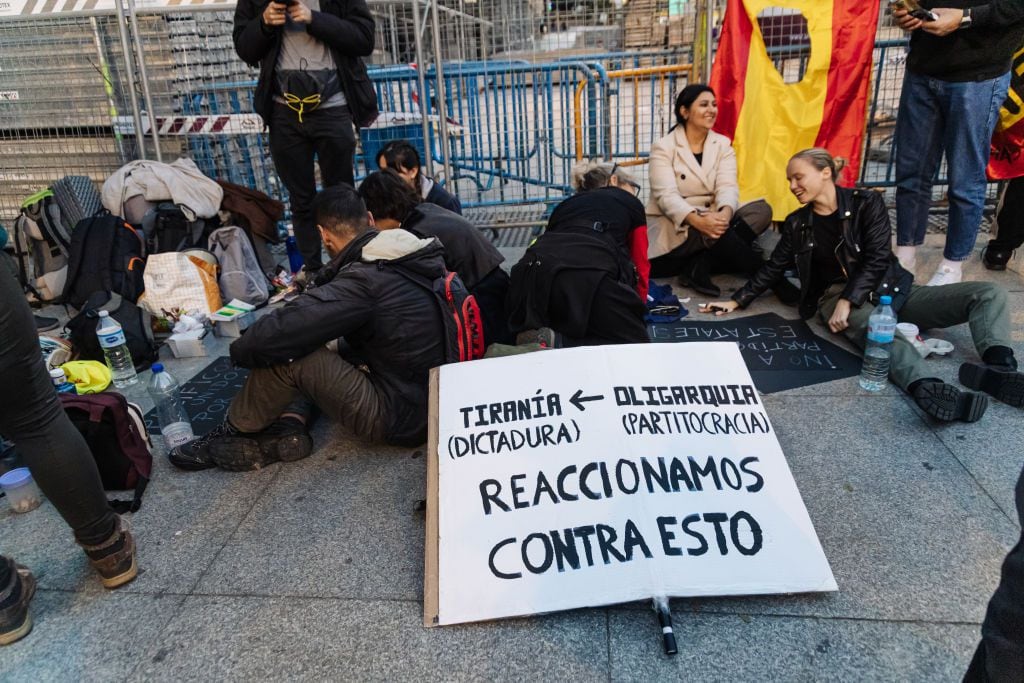 MADRID, SPAIN - NOVEMBER 12: Dozens of people during an encampment in front of the Congress of Deputies, on 12 November, 2023 in Madrid, Spain. The organization Junta Democratica de España organized last night, November 11, a rally in front of the Congress of Deputies, parallel to the one that took place in front of the PSOE headquarters in Ferraz, against the amnesty and "the political legacy of the '78 regime". About 500 people participated in the protest, in which the attendees were encouraged to camp out until their demands were fulfilled under the slogan 'Enough is enough. Let's put limits and control to the politicians'. (Photo By Carlos Lujan/Europa Press via Getty Images)