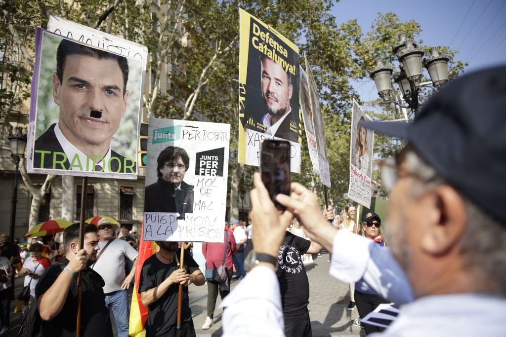 BARCELONA CATALONIA, SPAIN - OCTOBER 08: Dozens of people protest during an SCC demonstration against amnesty on October 8, 2023 in Barcelona, Catalonia, Spain. Sociedad Civil Catalana has called a demonstration against amnesty and the right to referendum under the slogan 'Not in my name: neither amnesty nor self-determination'. The protest seeks to make visible the agreement for the investiture of the Spanish government negotiated in recent weeks by the acting Prime Minister and Carles Puidgemont. It also commemorates the demonstration called for the referendum of October 1, 2017. (Photo By Kike Rincon/Europa Press via Getty Images)