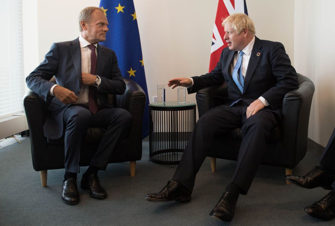 Donald Tusk y Boris Johnson