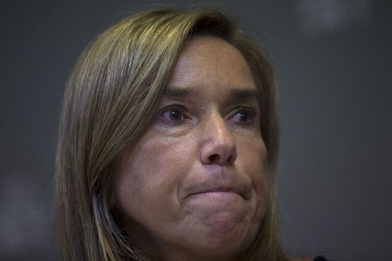 FILE - In this Oct. 6, 2014 file photo, Spain&#039;s Health Minister Ana Mato pauses during a news conference in Madrid, Spain. Spainx92s health minister has resigned hours after a judge said she benefited financially from an alleged corruption scheme that ens