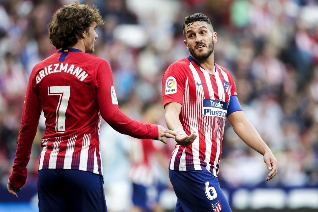 Griezmann y Koke, en un partido con el Atlético de Madrid.