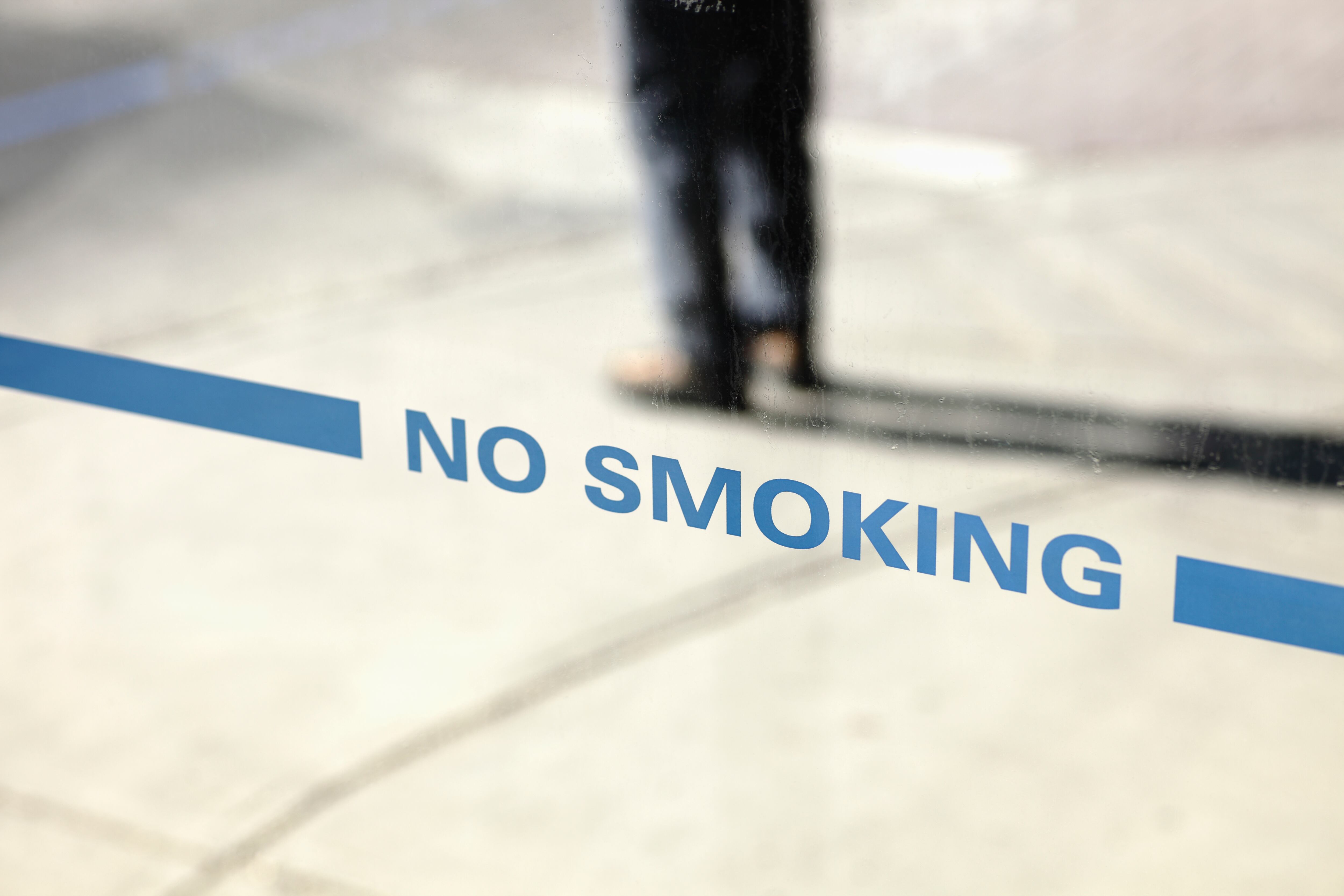 No Smoking directive on Bus Stop Shelter.