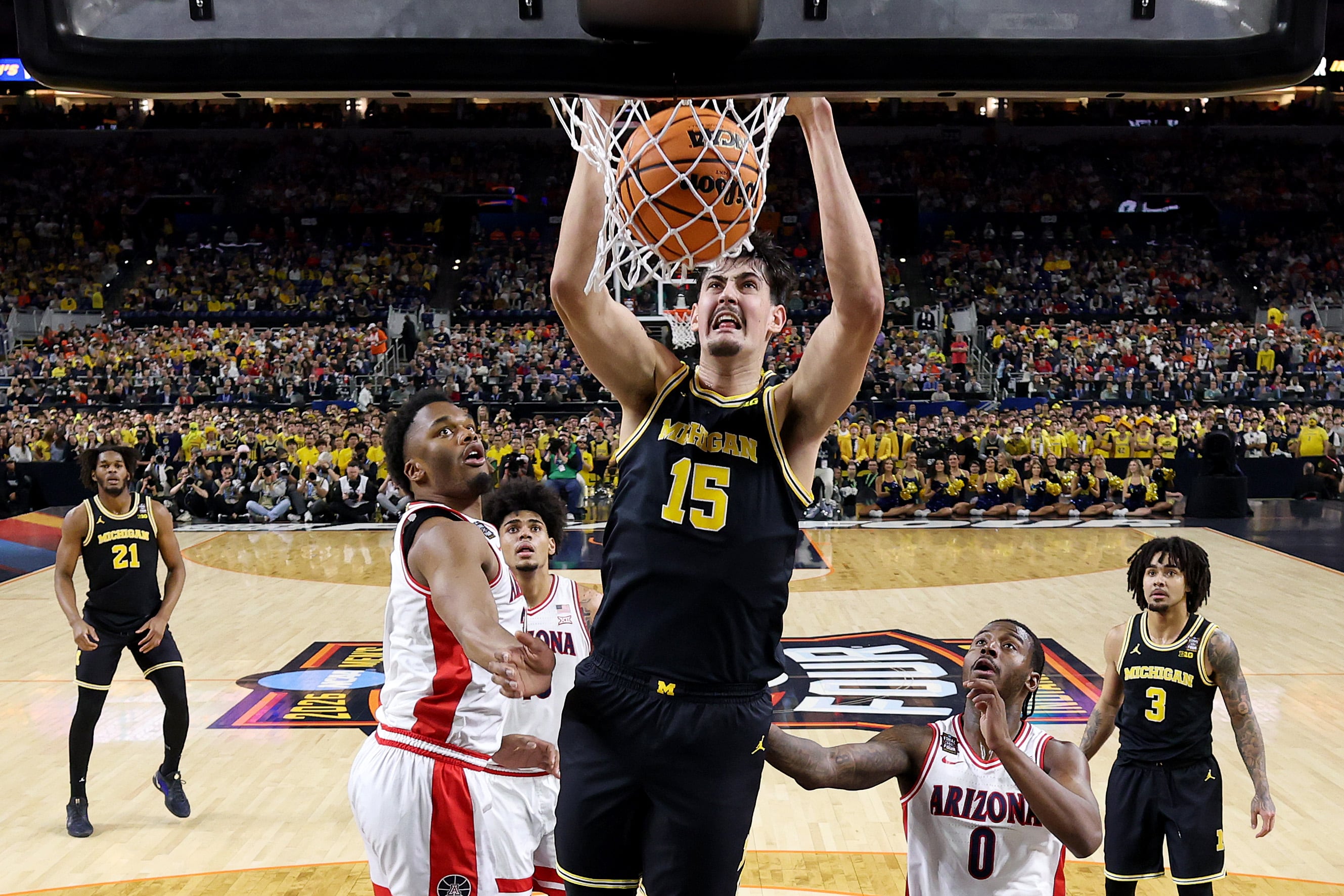 INDIANAPOLIS, INDIANA - APRIL 04: Aday Mara #15 of the Michigan Wolverines dunks the ball in the first half against the Arizona Wildcats in the Final Four of the 2026 NCAA Men's Basketball Tournament at Lucas Oil Stadium on April 04, 2026 in Indianapolis, Indiana. (Photo by Jamie Schwaberow/NCAA Photos via Getty Images)