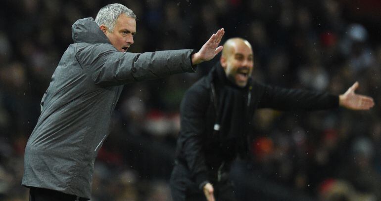 Mourinho y Guardiola, en un partido de la Premier League.