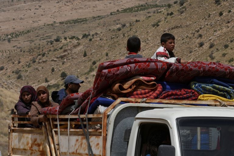 Refugiados sirios en su camino a Líbano