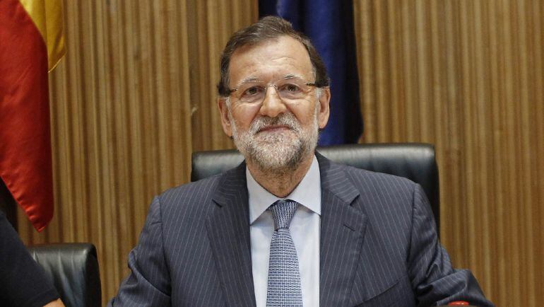 GRA128. MADRID, 14/09/2015.- El presidente del Gobierno, Mariano Rajoy, al inicio hoy de la reunión plenaria del grupo popular en el Congreso, a la que han asistido diputados y senadores, así como destacados miembros del partido y del Gobierno, para anali