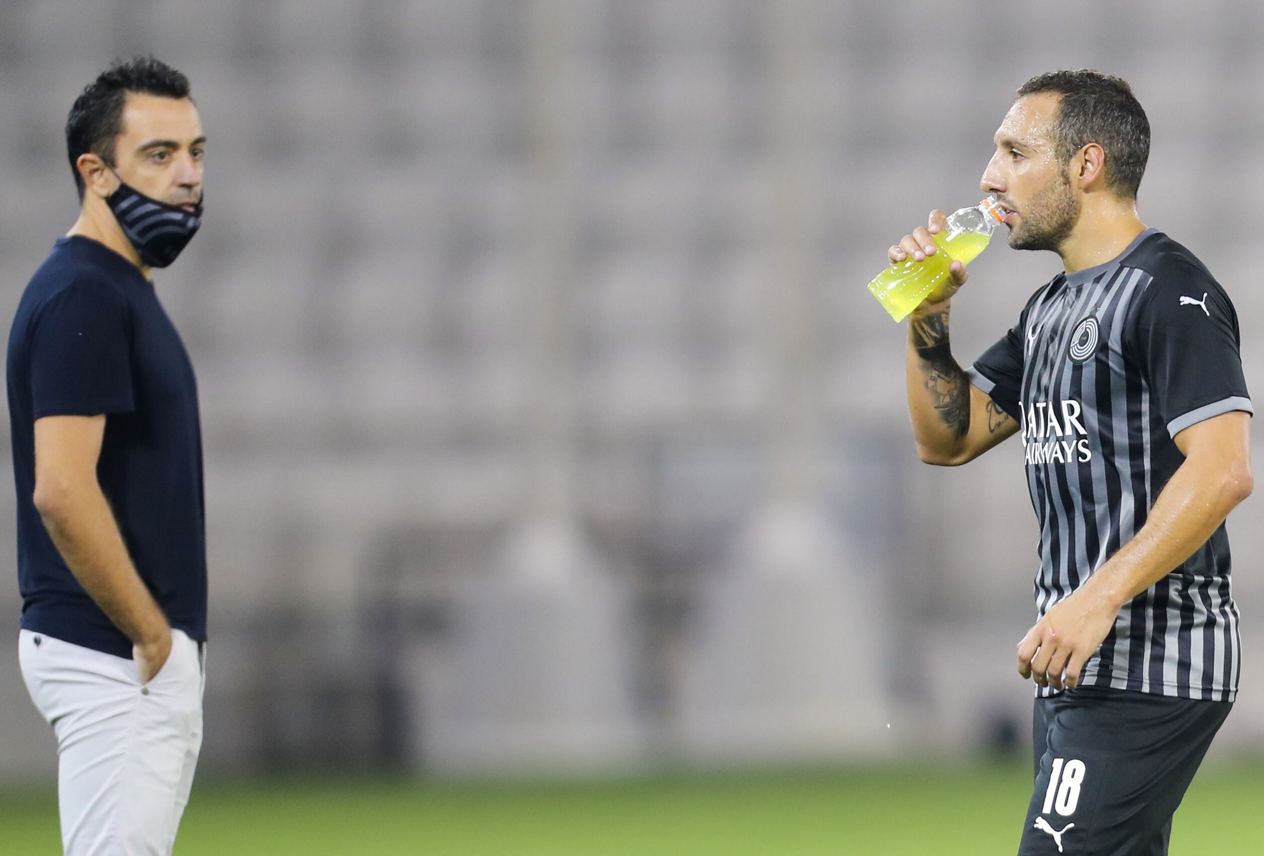 Xavi Hernández y Santi Cazorla, en una fotografía de archivo.