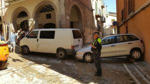 Cotxes que la força de l'aigua va arrossegar. Imatge del 24 de setembre