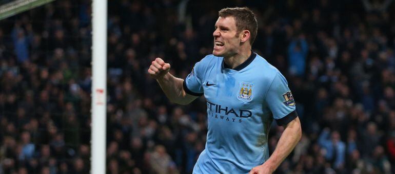 MANCHESTER, ENGLAND - JANUARY 04:  James Milner of Manchester City celebrates after scoring a goal to level the scores at 1-1 during the FA Cup Third Round match between  Manchester City and Sheffield Wednesday at Etihad Stadium on January 4, 2015 in Manc