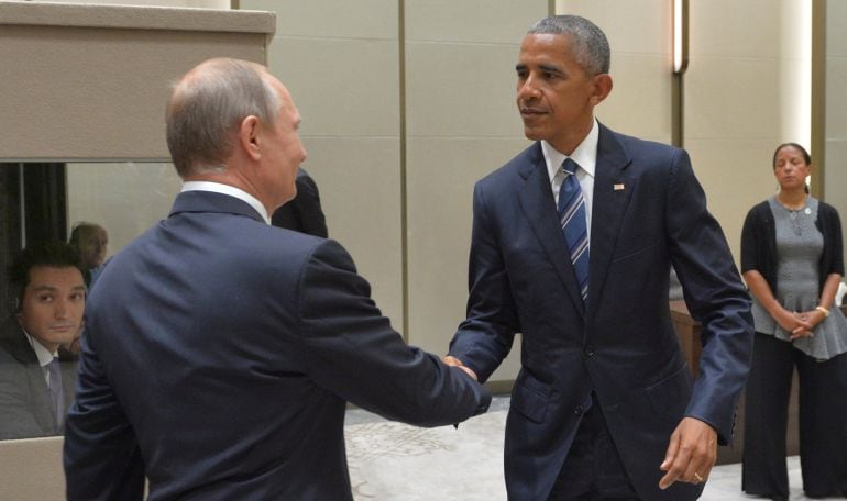 Vladimir Putin (izquierda) y Barack Obama (derecha), durante su reunión en Hangzhou (China)