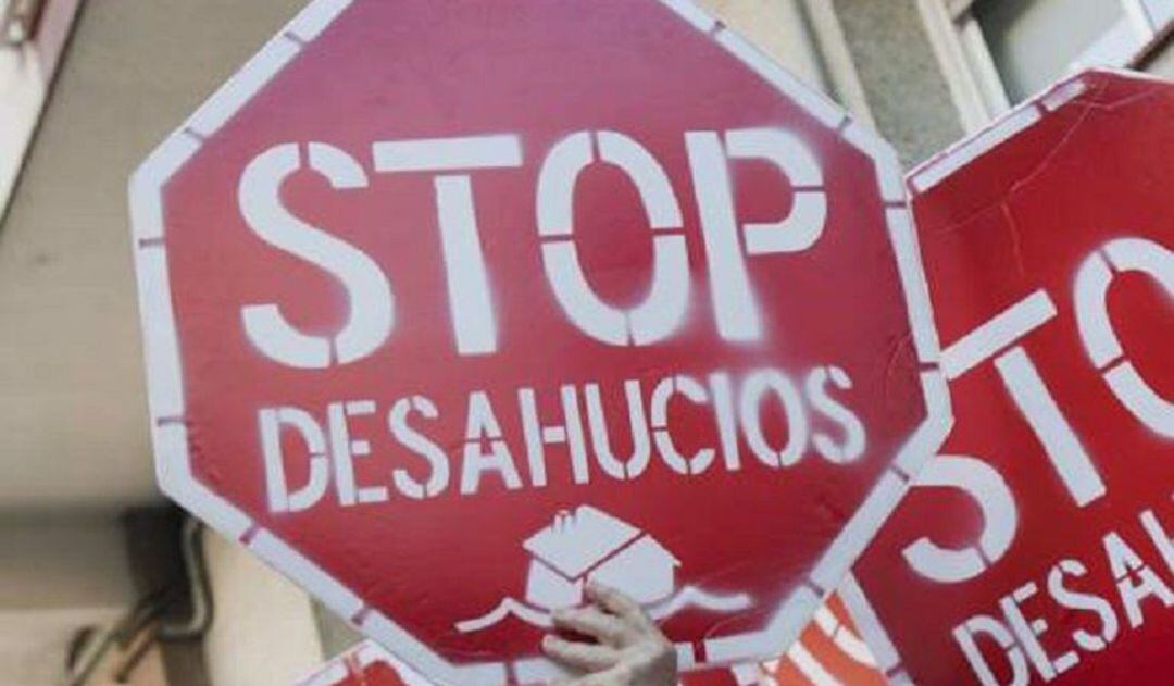 Cartel de la plataforma Stop Desahucios