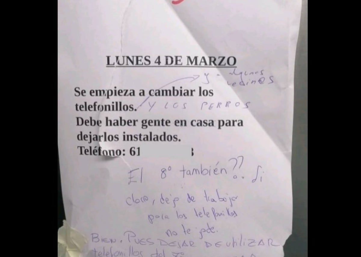 Cartel en una comunidad de vecinos.