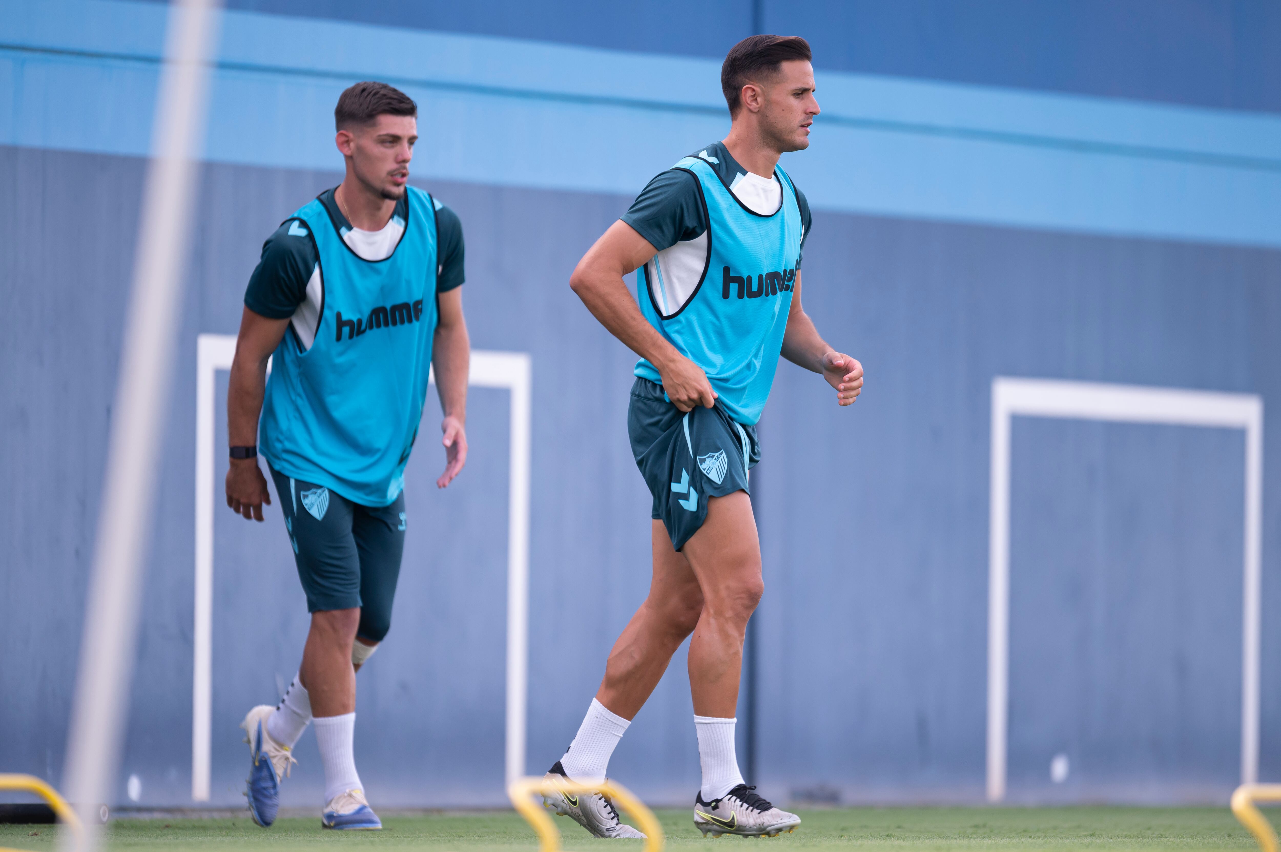 Luismi, junto a Montero, en un entrenamiento del Málaga