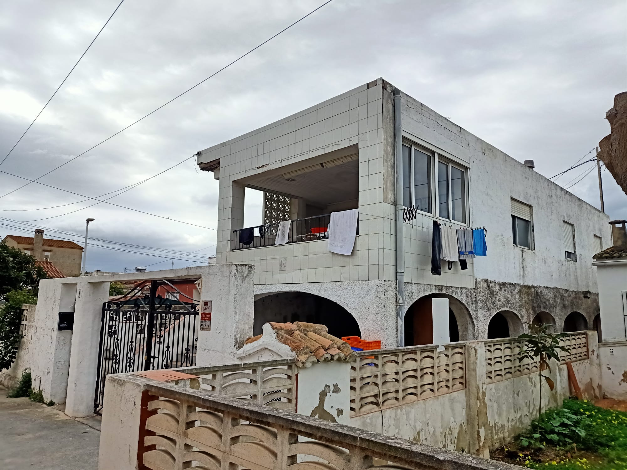 Vivienda donde han asesinado a un hombre en el distrito de Venecia en Gandia