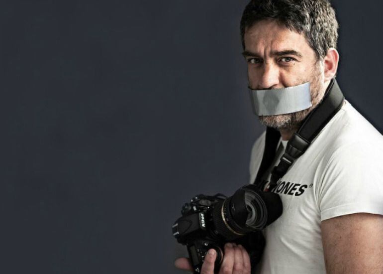 Cartel de apoyo al fotoperiodista condenado