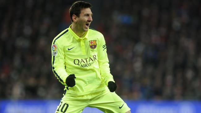 Barcelona's Argentinian forward Lionel Messi celebrates after scoring during the Spanish league football match Athletic Club Bilbao vs FC Barcelona at the San Mames stadium in Bilbao on February 8, 2015. Barcelona won 5-2. AFP PHOTO/ ANDER GILLENEA