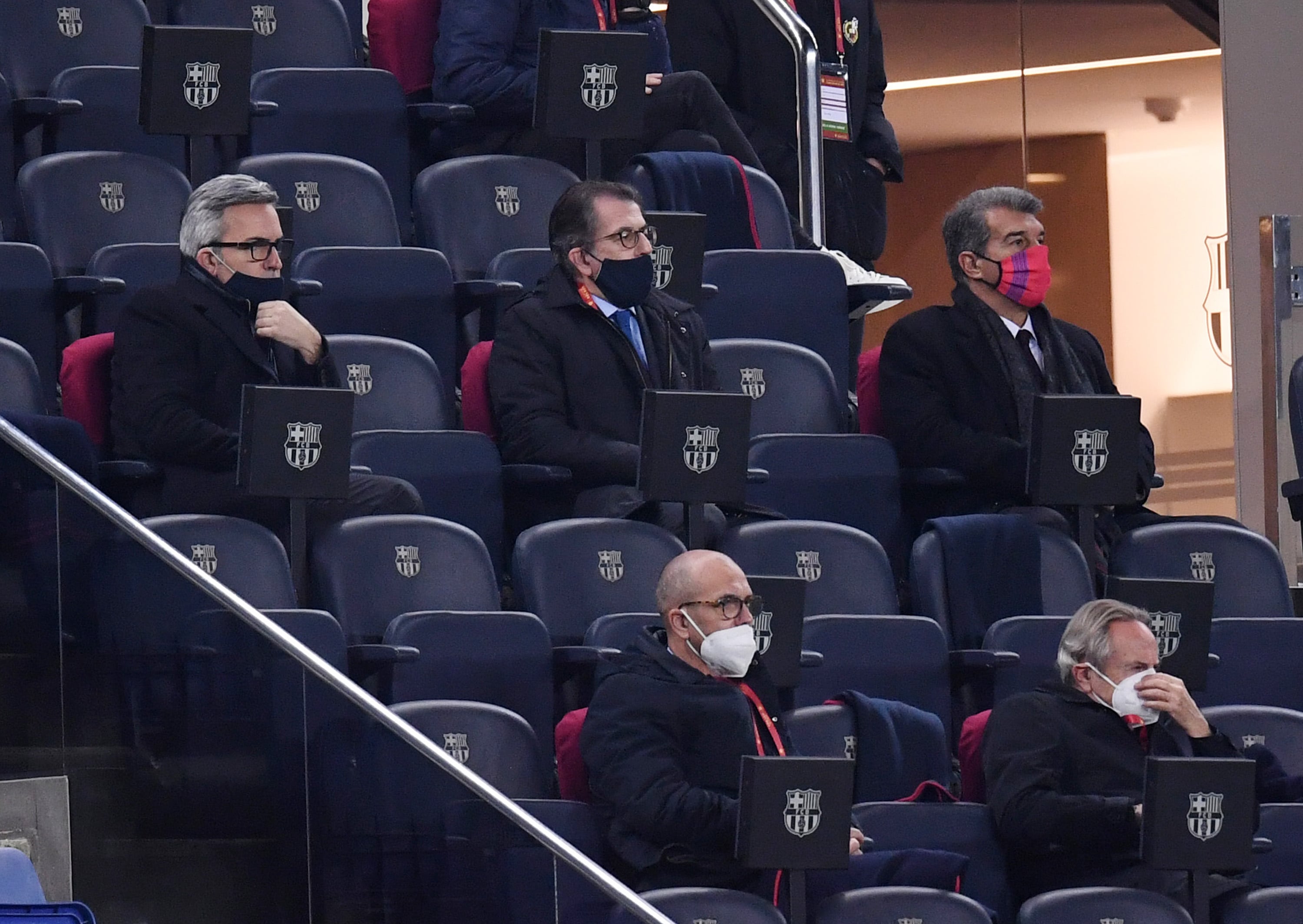 BARCELONA, SPAIN - MARCH 03: Candidates for the Barcelona presidency (L_R) Victor Font, Toni Freixa and Joan Laporta look on from the stands during the Copa del Rey Semi Final Second Leg match between FC Barcelona and Sevilla at Camp Nou on March 03, 2021 in Barcelona, Spain. Sporting stadiums around Spain remain under strict restrictions due to the Coronavirus Pandemic as Government social distancing laws prohibit fans inside venues resulting in games being played behind closed doors. (Photo by David Ramos/Getty Images)