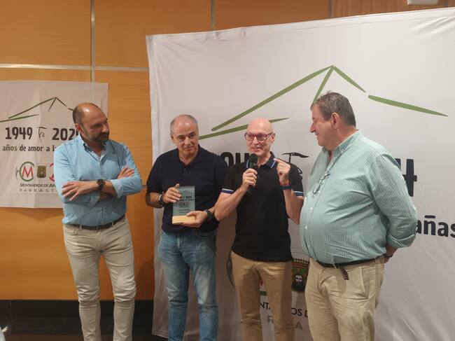 Fernando Torres, Javier Franco y Miguel Hecho ( Gráficas Barbastro) y José Masgrau