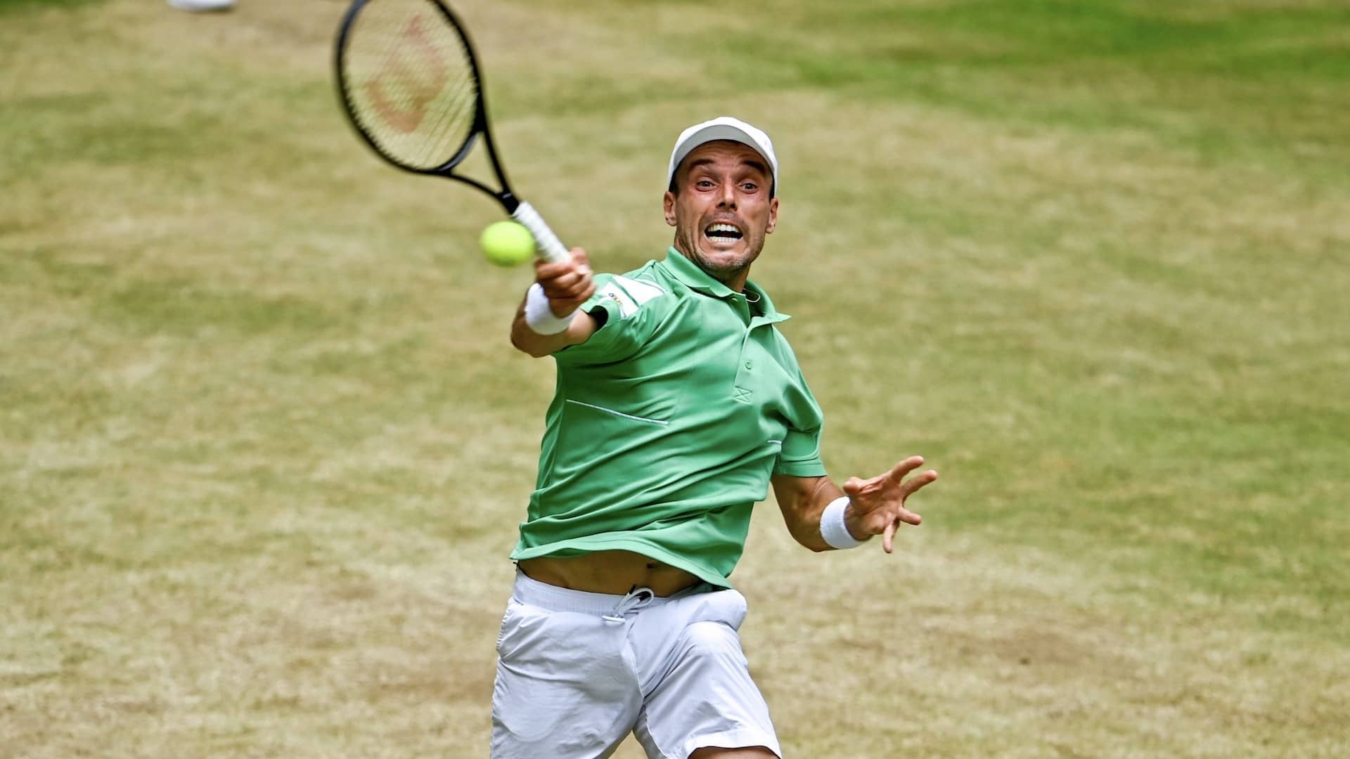 HALLE, GERMANY - JUNE 17: Roberto Bautista Agut of Spain plays a forehand in his match against Daniil Medvedev of Russia during day seven of the 29th Terra Wortmann Open at OWL-Arena on June 17, 2022 in Halle, Germany. (Photo by Thomas F. Starke/Getty Images)