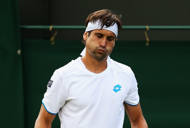 David Ferrer suspira tras un punto en el duelo ante Kuznetsov