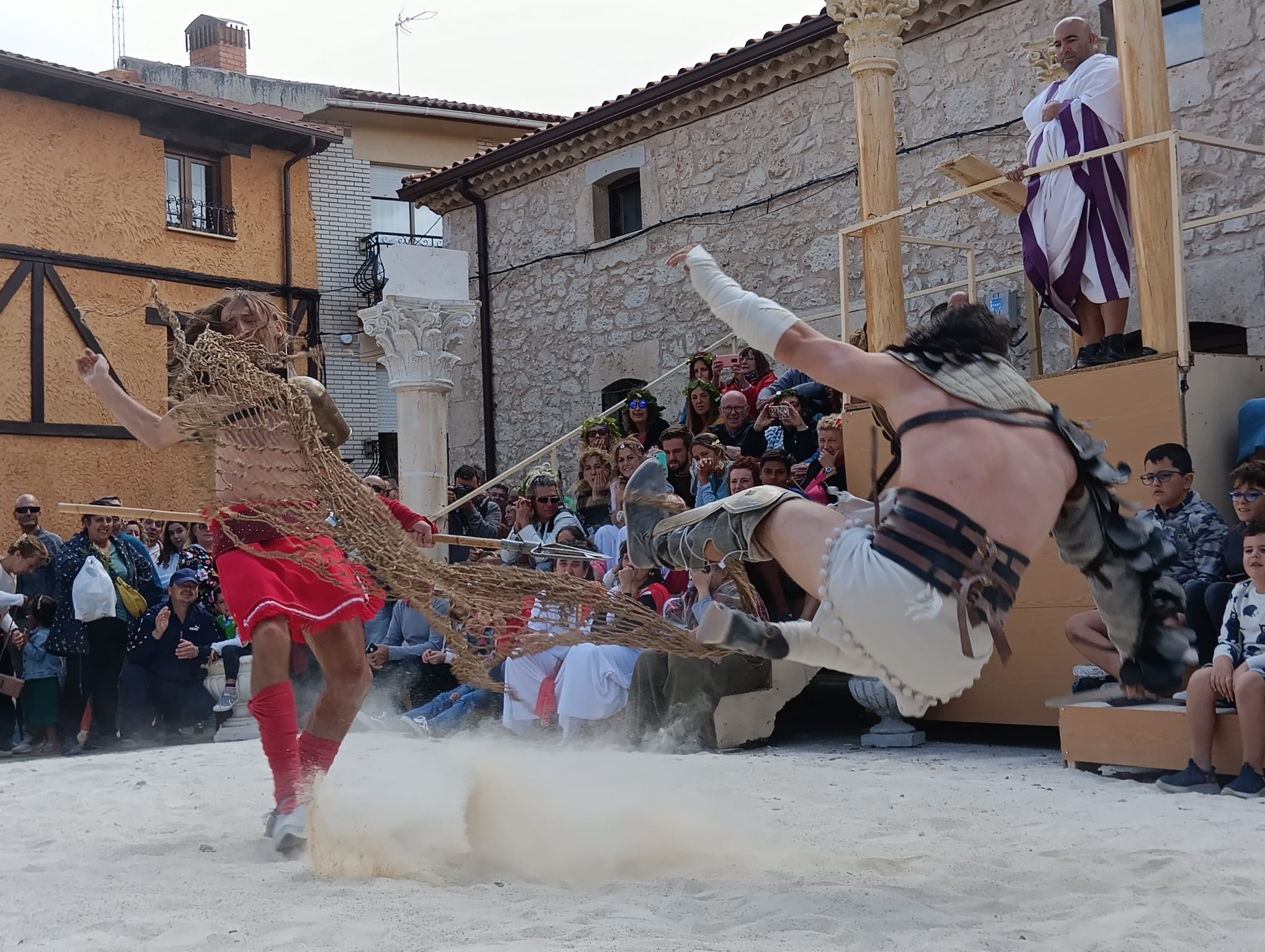 Luchas de gladiadores tras el pregón del dios del vino