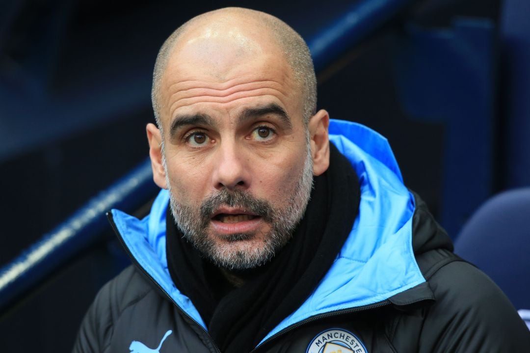 Guardiola en el banquillo del Manchester City