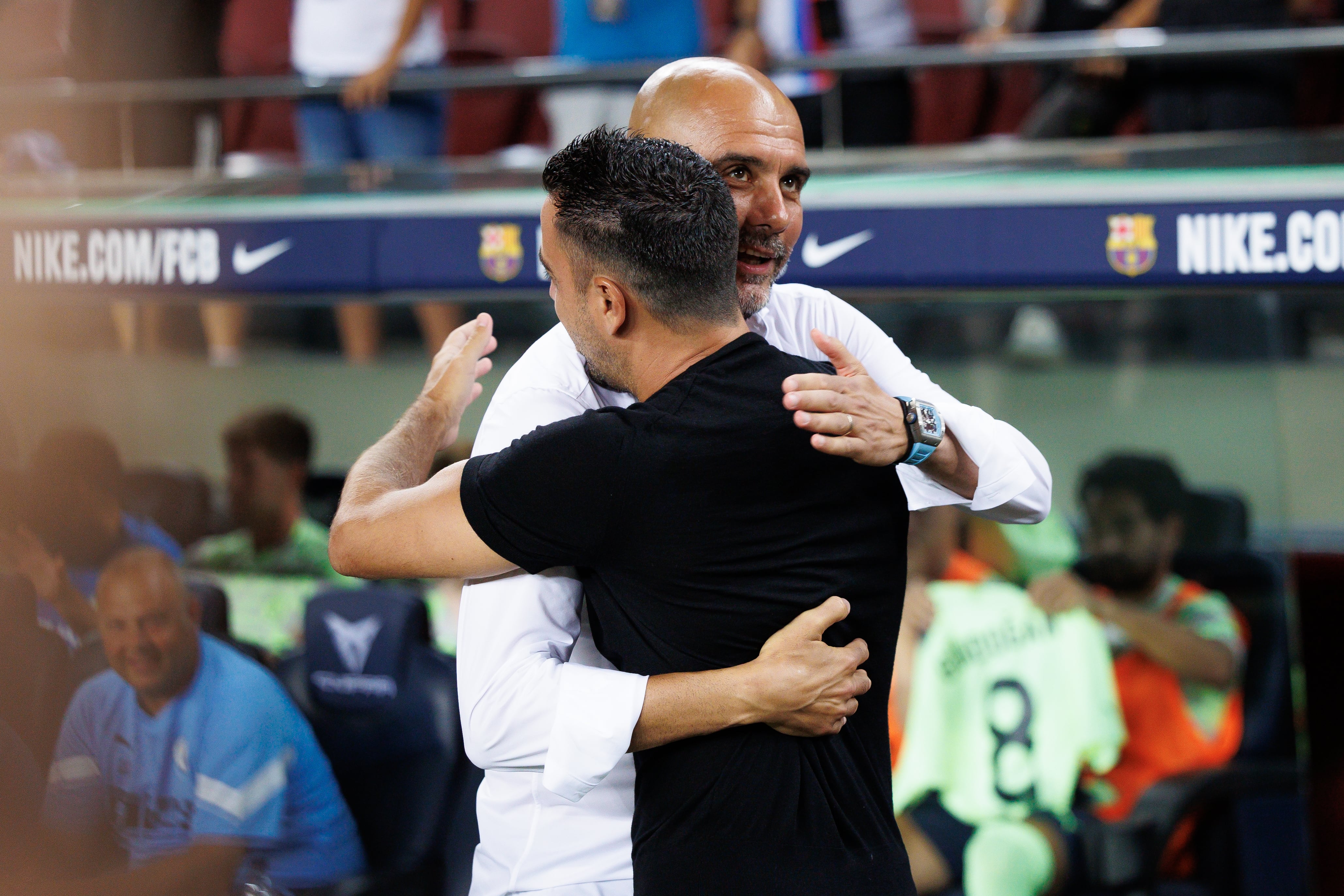 BARCELONA, SPAIN - AUGUST 24: Coach Pep Guardiola of Manchester City and coach Xavi Hernandez of FC Barcelona prior to the Friendly match between FC Barcelona and Manchester City at Spotify Camp Nou on August 24, 2022 in Barcelona, Spain (Photo by DAX Images/Orange Pictures/BSR Agency/Getty Images)