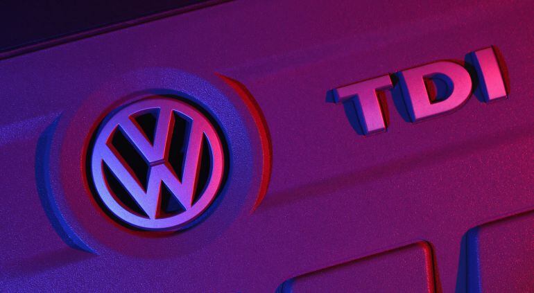 BERLIN, GERMANY - OCTOBER 06: The 2.0 turbodiesel engine of a 2014 Volkswagen Passat passenger car affected by the Volkswagen diesel emissions software scandal stands illuminated under coloured lights on October 6, 2015 in Berlin, Germany. Volkswagen has admitted that 8 million cars and light trucks in Europe alone are affected by the software the company deliberately installed in order to manipulate diesel emissions results under testing conditions. Since news of the issue broke two weeks ago Volkswagen's share price has dropped by over 40% and the company faces investigations and fines in countries across the globe. (Photo by Sean Gallup/Getty Images)