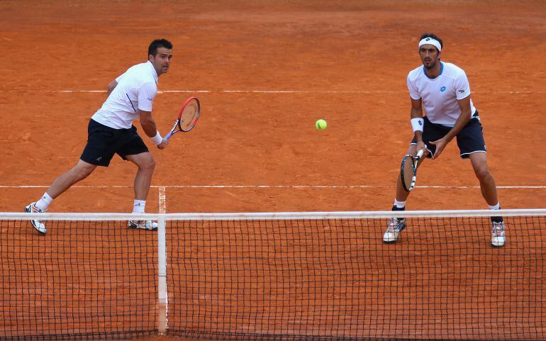 Daniele Bracciali y Potito Starace compitiendo en el Masters 1000 de Roma 2014.