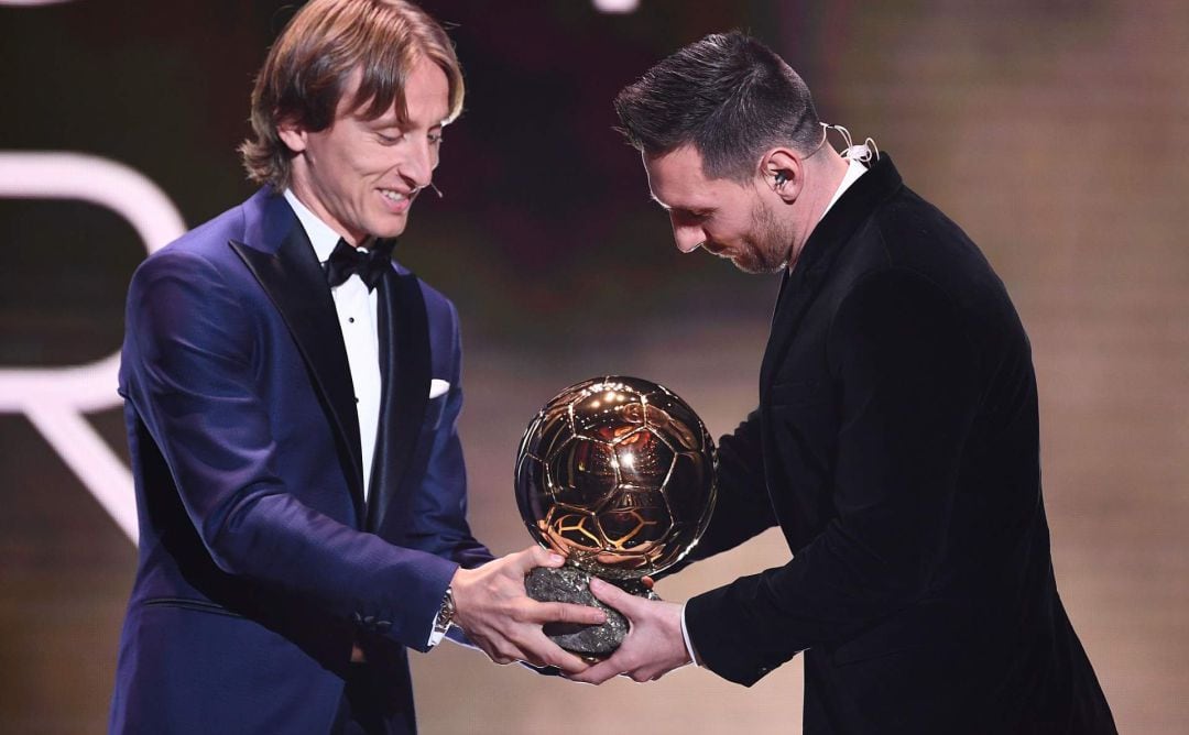 Luka Modric y Leo Messi.