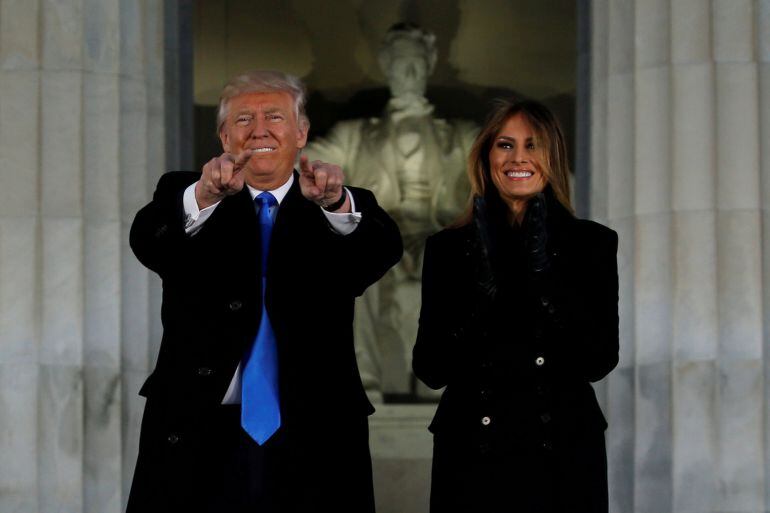 President-elect Donald Trump and his wife Melania take part in a Make America Great Again welcome concert at the Lincoln Memorial in Washington, U.S. January 19, 2017. REUTERS/Jonathan Ernst/File Photo