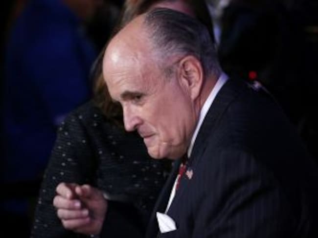 Former New York City Mayor Rudy Giuliani finishes a television interview at Republican U.S. presidential nominee Donald Trump's election night rally in Manhattan, New York, U.S., November 8, 2016. REUTERS/Jonathan Ernst