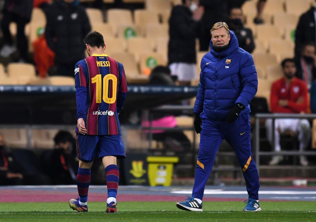 Messi y Koeman, en un partido con el Barça