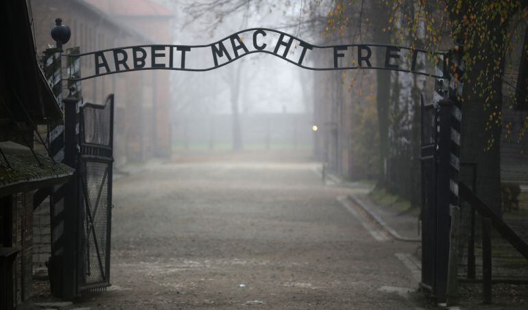 OSWIECIM, POLAND - NOVEMBER 15:   The infamous German inscription that reads &#039;Work Makes Free&#039; at the main gate of the Auschwitz I extermination camp on November 15, 2014 in Oswiecim, Poland. Ceremonies marking the 70th anniversary of the liberation of th