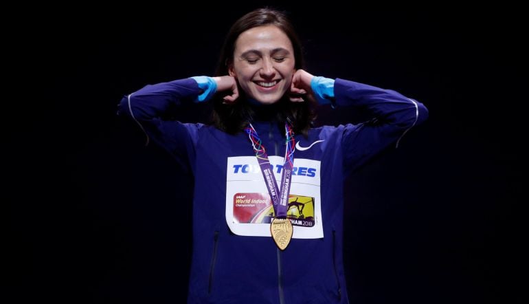 Neutral athlete Mariya Lasitskene celebrates with her gold medal 