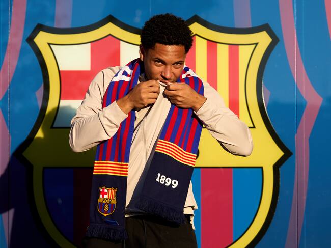 BARCELONA, SPAIN - DECEMBER 27: Vitor Roque poses for the media as he is unveiled as new FC Barcelona player at Spotify Camp Nou on December 27, 2023 in Barcelona, Spain. (Photo by Alex Caparros/Getty Images)