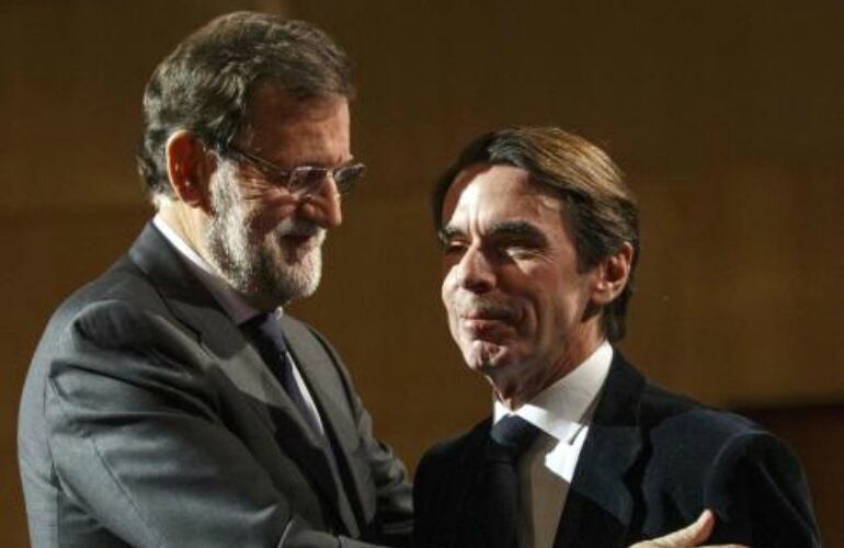 Mariano Rajoy y José María Aznar, durante la convención del PP.