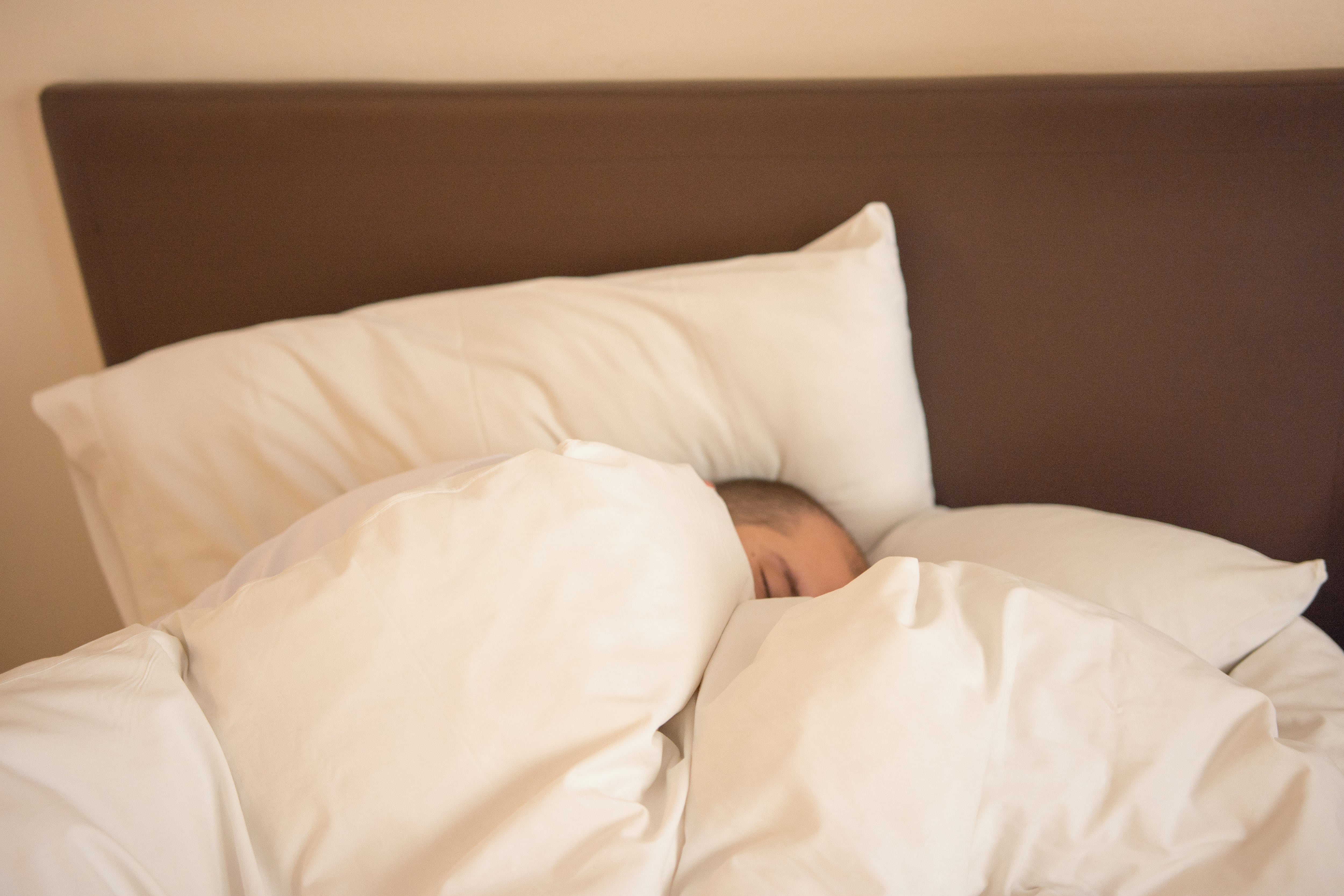 Foto de stock de una persona durmiendo