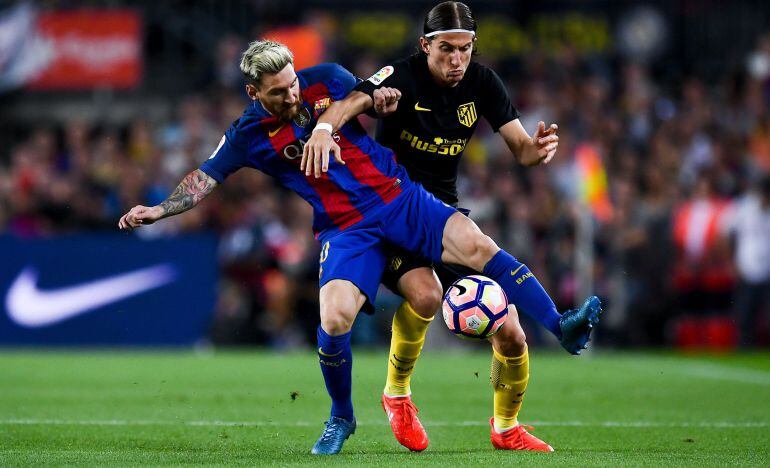 Leo Messi y Filipe Luis, en el choque entre el Barcelona y el Atlético (1-1) de la jornada 5 de la Liga Santander.