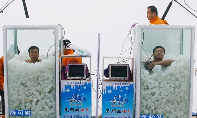 Una instantánea de la competición de Chen y Jin, metidos en sus cabinas de hielo