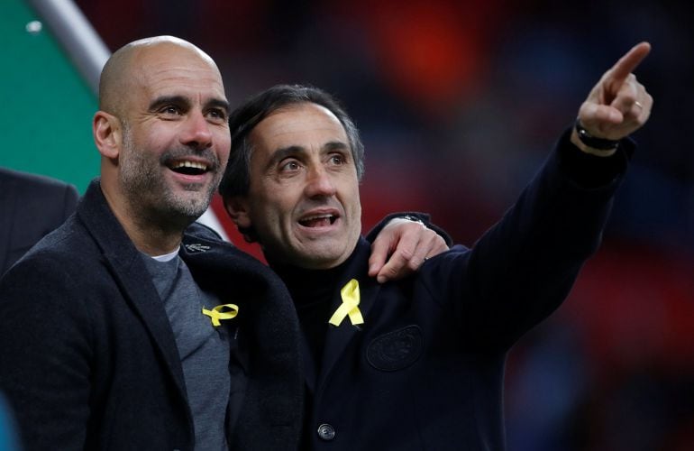 Guardiola y Estiarte, con el lazo amarillo en sus solapas