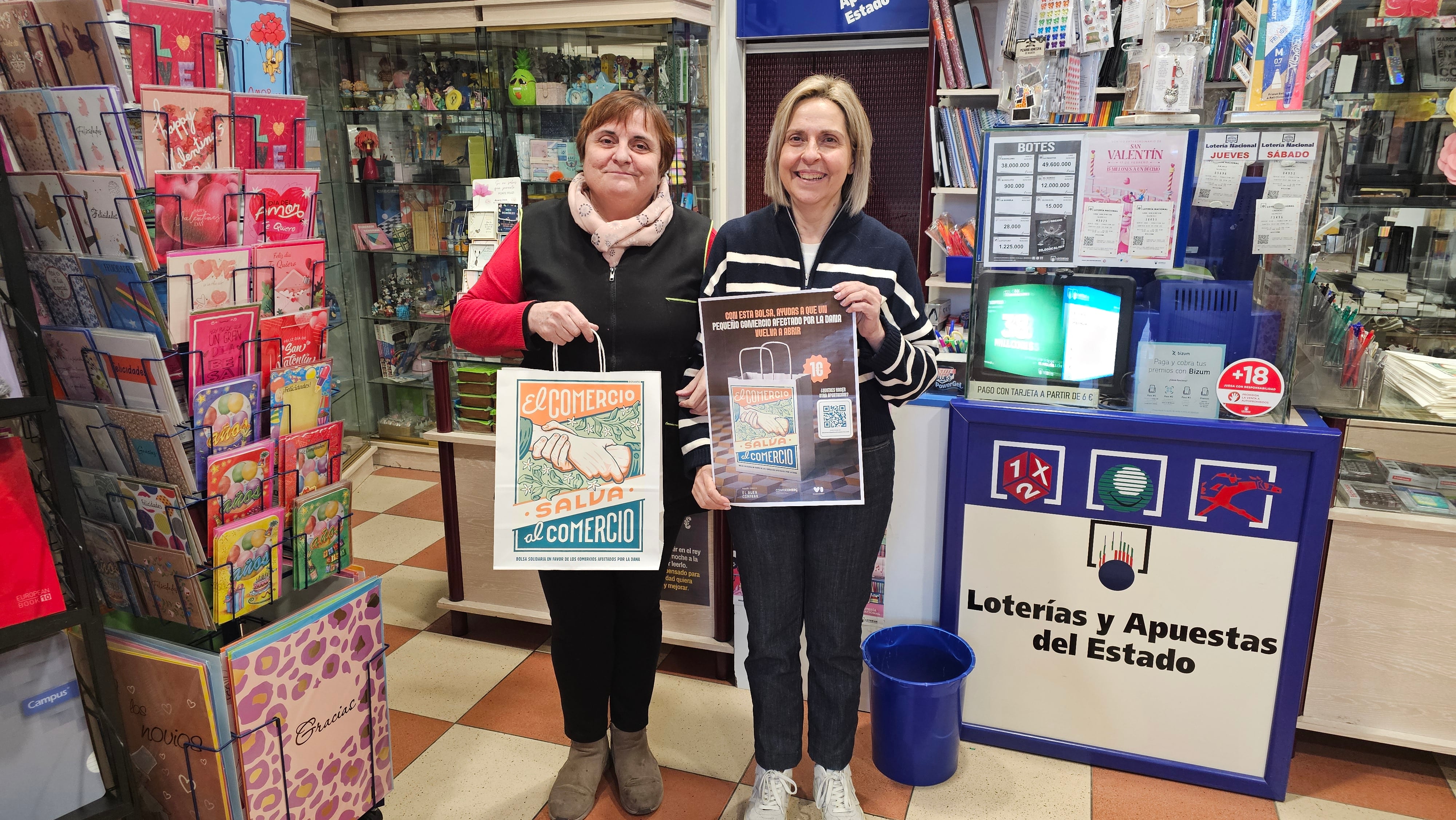 Comerciantes con la bolsa de la campaña