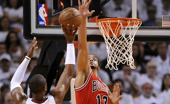 Wade tira a canasta ante Joakim Noah