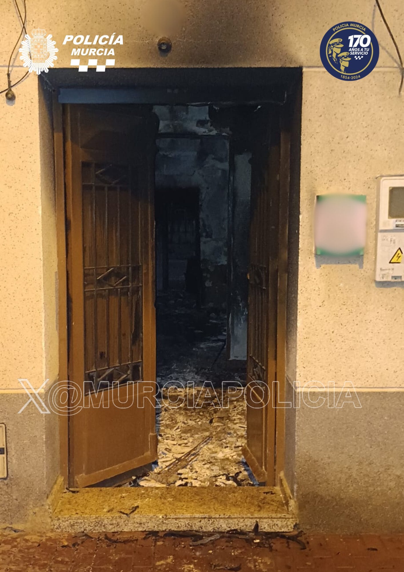 Incendio intencionado de una vivienda en el barrio murciano de Santiago El Mayor