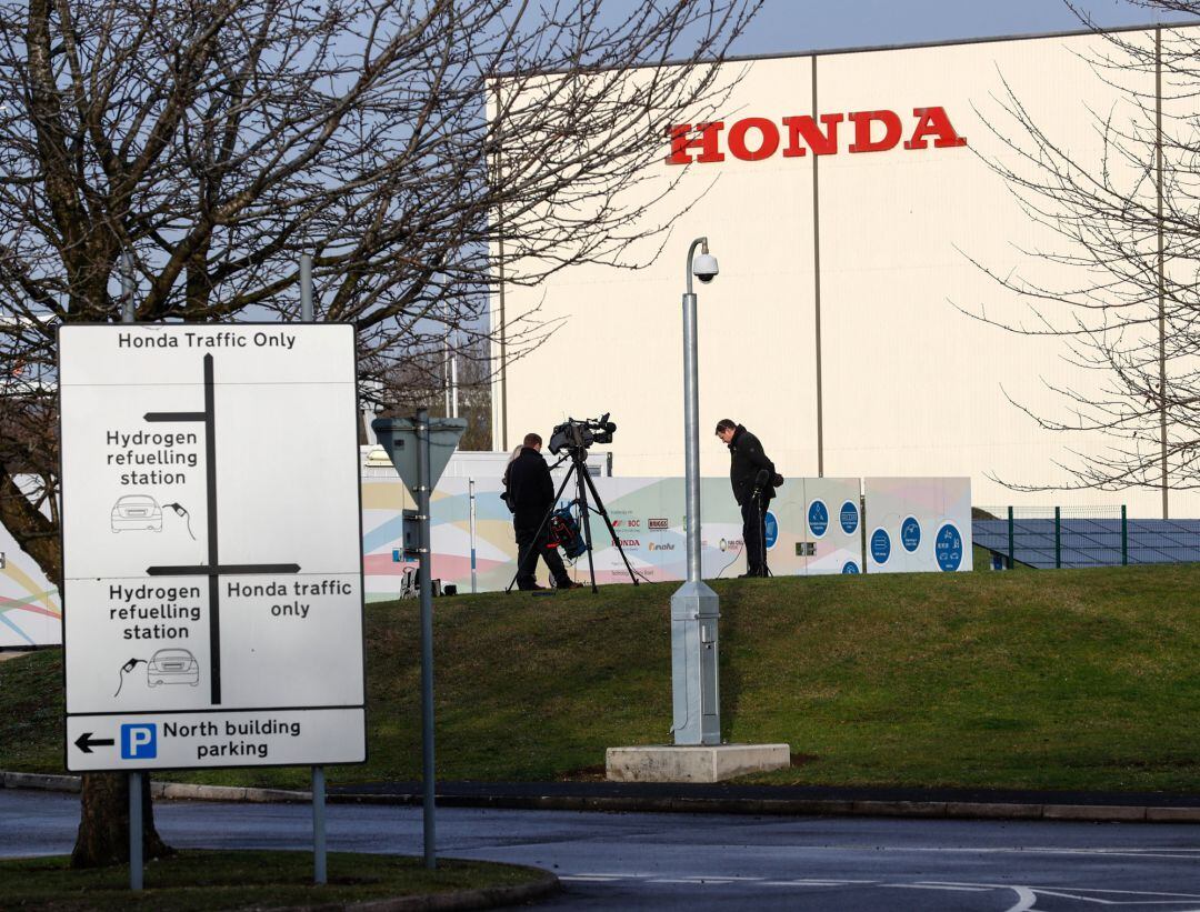 Members of media stand outside the Honda car plant in Swindon, Britain, February 18, 2019. 