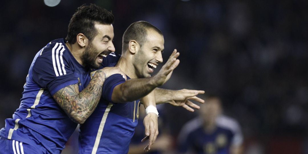 Lavezzi y Mascherano, durante un amistoso previo al Mundial de Brasil 2014