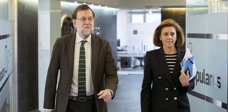 Mariano Rajoy, y la secretaria general y presidenta del PP en CLM, María Dolores de Cospedal, a su llegada a la reunión del Comité de Dirección