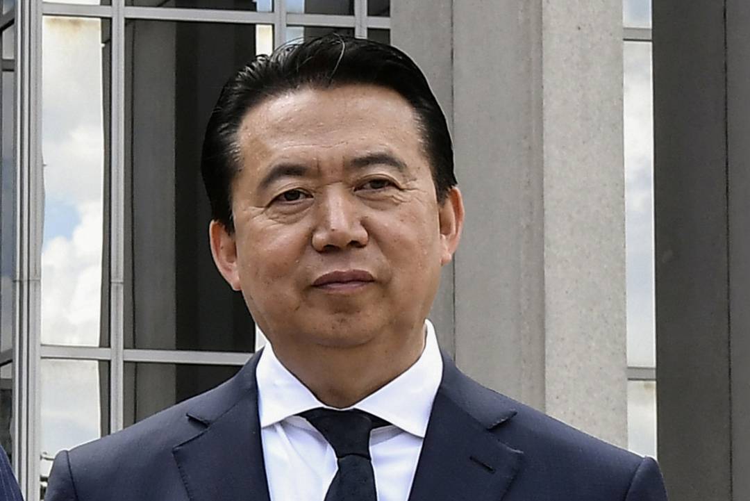 El presidente de Interpol, Meng Hongwei, durante una visita al cuartel general en Lyon