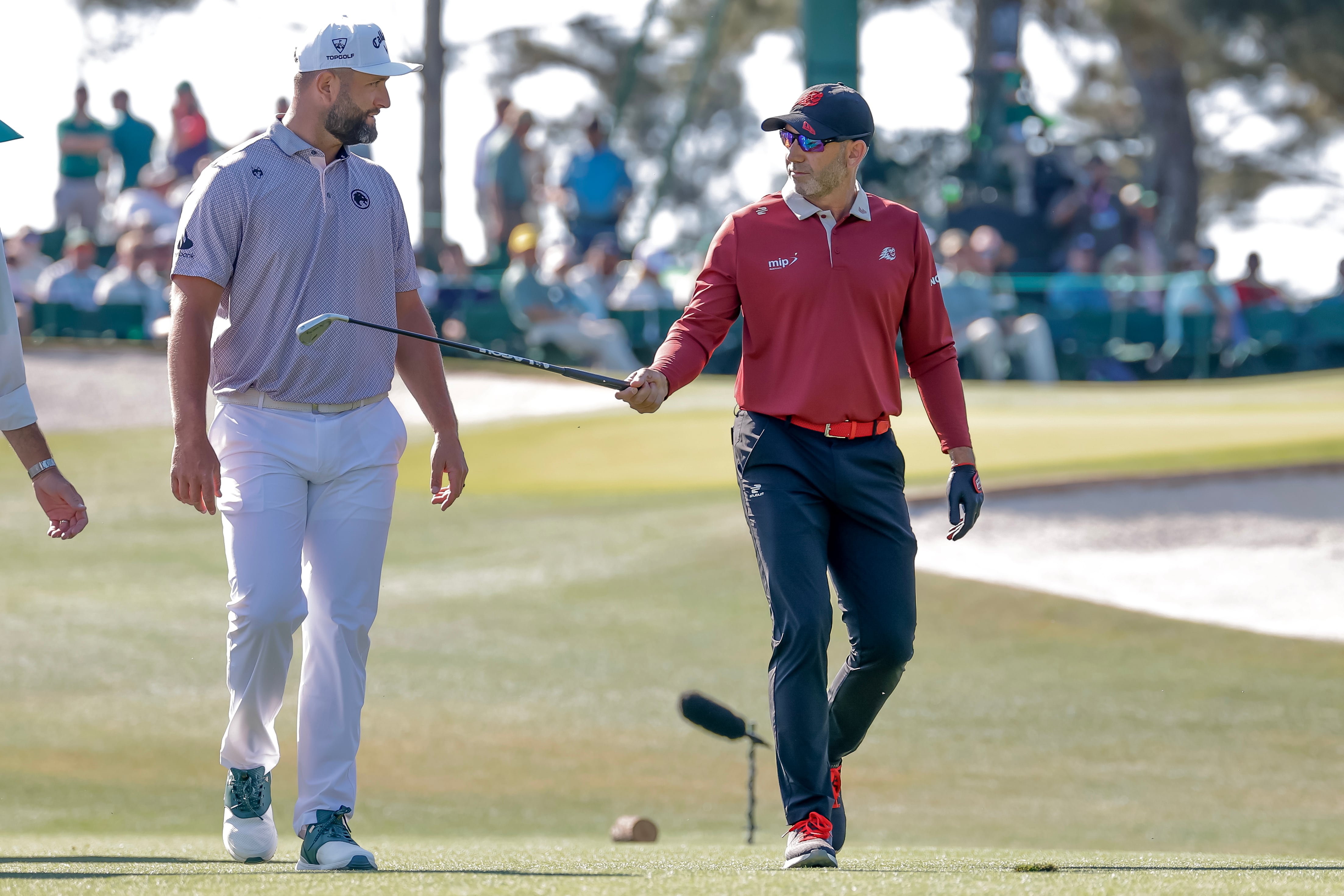 AUGUSTA (United States), 12/04/2026.- Jon Rahm (L) and Sergio Garcia (R) of Spain walk off the tee on the third hole during the final round of the 2026 Masters Tournament at the Augusta National Golf Club in Augusta, Georgia, USA, 12 April 2026. (España) EFE/EPA/ERIK S. LESSER